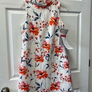 Casual White and Orange Dress with Vibrant Floral Design